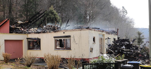 a completely burned down house without a roof 
