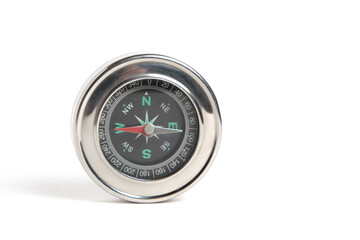 Compass on white background pointing west and east.