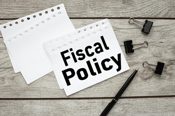 fiscal policy. text on white paper. notebook sheets