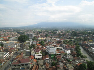 Bogor, Indonesia - April 20, 2018: View of settlements and buildings from the roof of BTM Mall at noon
