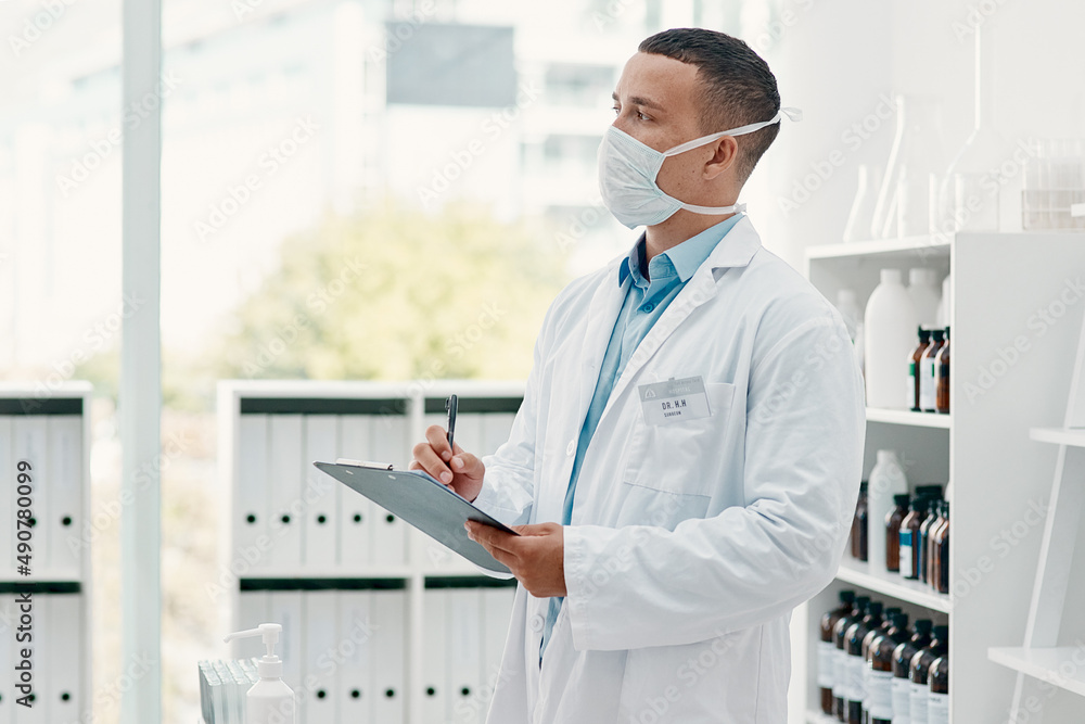 Aufkleber the cure for fear is knowledge. shot of a young scientist writing notes on a clipboard in a laborato