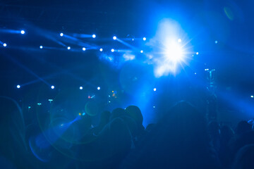 Fototapeta na wymiar Spotlights. Direct spotlight rays in the concert hall. Concert background