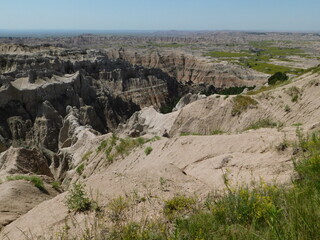The colorful hills of South Dakota's Badlands stretch beyond the horizon