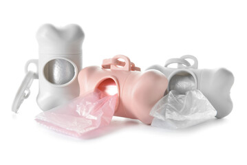 Different dispensers with pet waste bags isolated on white background