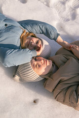mom and daughter walk in the spring forest