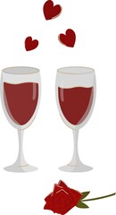 Glasses of red wine and a red rose. 