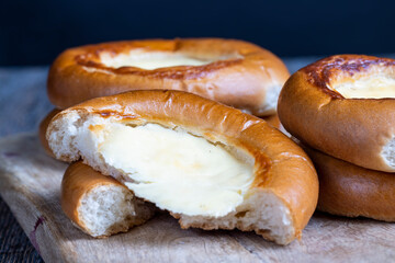 sweet dough pastries with sour cream and milk filling
