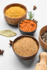Bowls with aromatic spices isolated on white background, closeup
