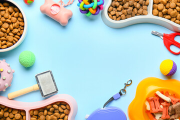 Frame made of different pet care accessories and food on color background, closeup