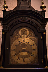 Antique gold and wood wall clock