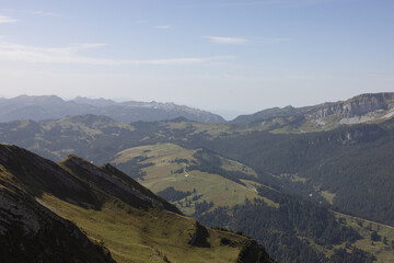 Naklejka premium Amazing hiking day in the alps of Switzerland. Wonderful view over a beautiful lake called Brienzersee. What an amazing view.