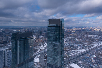 Fototapeta na wymiar View from the Moscow City tower. Panorama of the winter city