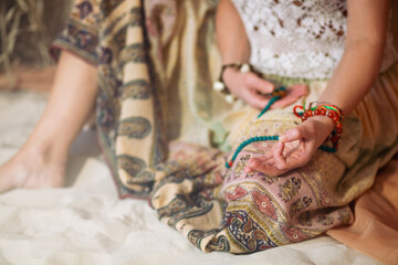 The concept of zen, peace, balance. A woman sits and meditates  using Mudra, keeping her legs...