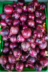 red onions in the market in lisbon portugal

