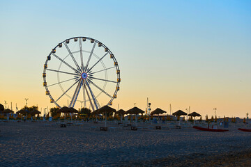 Rimini ferris wheel at sunset
