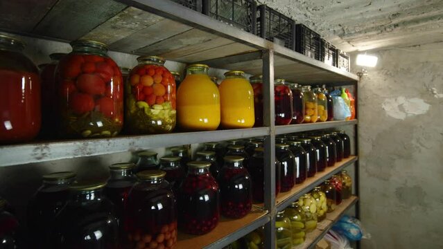 Bunker with food for self-isolation during hostilities. Products in the basement of the house