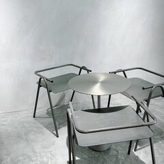 Beautiful shot of modern chairs and table - in grayscale