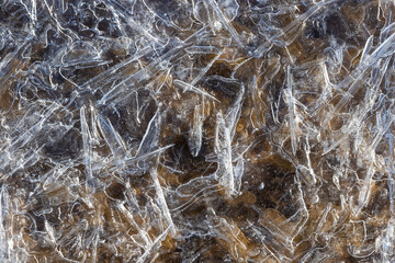 Ice crystal surface background. Water bubbles visible.