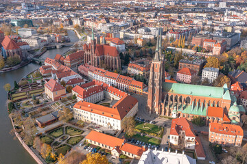 Aerial view of the center of an old European city, beautiful red roofs, old houses and a church. Wroclaw, Poland
