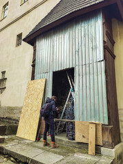 Fototapeta premium LVIV, UKRAINE, March 4, 2022: Lviv hides the most valuable cultural monuments to rpotect it from russian boombs