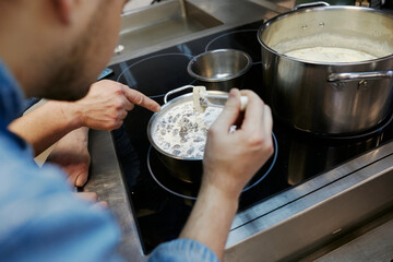 the process of boiling morel mushrooms in milk