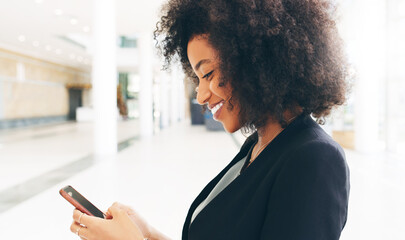 Managing her personal and professional priorities with this handy tool. Shot of a happy young...