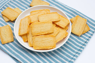 Cheese crispies on white background.