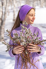 On a sunny spring day, a young girl walks, travels through the forest, collects willow for the Easter holiday. The girl walks among the birches, collects willows, rejoices, laughs, the Easter holiday.
