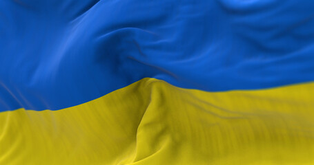 Detail of the national flag of Ukraine waving in the wind