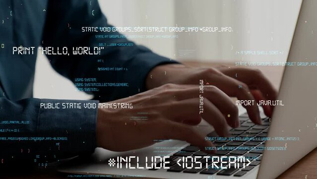 Computer programmer uses capable laptop computer to develop programming code of new software . Computer specialist working on future coding application for software programming development .