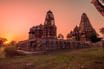 Sunrise in the Western Group of Temples at Khajuraho, Madhya Pradesh, India - A Unesco world...
