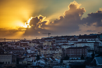 Sunset over Lisbon, aerial view from Miradouro da Graca viewing point in Lisbon city, Portugal