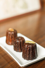 Caneles de bordeaux - traditional French sweet dessert