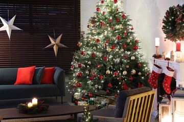 Cozy living room interior with beautiful Christmas tree and fireplace