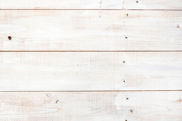 Fototapeta na wymiar 白いペンキを塗った木の板