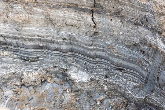 texture of stone, flow pattern. sinkhole, also called sink or doline, topographic depression formed when underlying limestone bedrock is dissolved by groundwater. Underground wrinkles formed from