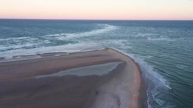 Drone Over People Walking Along Grenen Sandbar