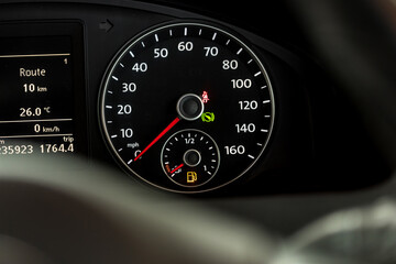 Empty fuel warning light in car dashboard. Fuel pump icon. gasoline gauge dash board in car with...