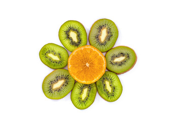 Fototapeta na wymiar Funny pictures from slices of kiwi fruit and orange, children's food