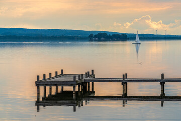 A jetty at the shore of the bathing island in Steinhude with view at the Steinhuder, Lower Saxony, Germany