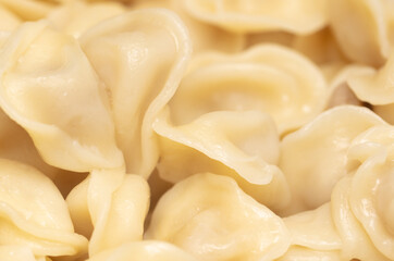 Boiled dumplings made from dough and meat.