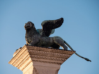 Lion of Venice Bronze Sculpture on the Column of Saint Mark on the Piazzetta San Marco Square in Venice, Italy