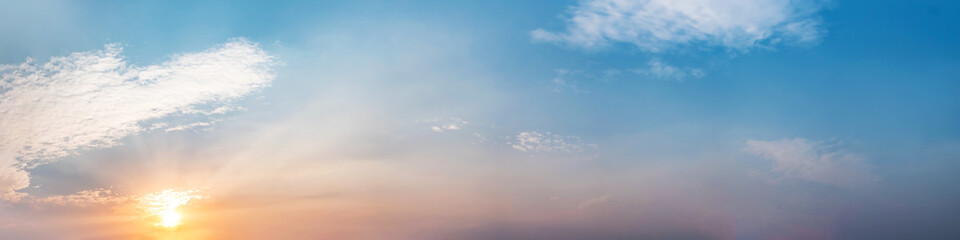 Obraz premium Dramatic panorama sky with cloud on sunrise and sunset time. Panoramic image.