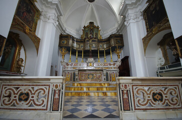 Fototapeta na wymiar Larino - Molise - Monumental Church of San Francesco, the interior with the main altar, the niches with the saints and the frescoes