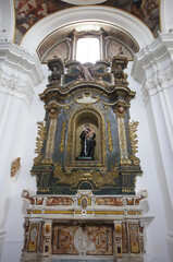 Larino - Molise - Monumental Church of San Francesco, the interior with the main altar, the niches with the saints and the frescoes