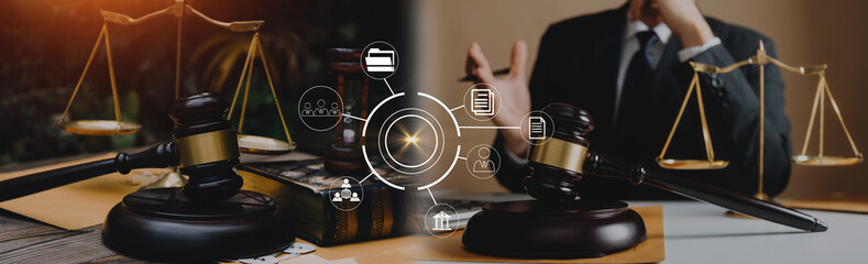 justice and law concept.Male judge in a courtroom on wooden table and Counselor or Male lawyer working in office. Legal law, advice and justice concept.