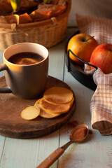 Fototapeta na wymiar Tea with apples and cinnamon