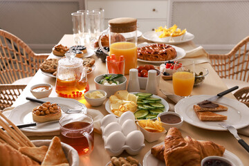 Dishes with different food on table in room. Luxury brunch