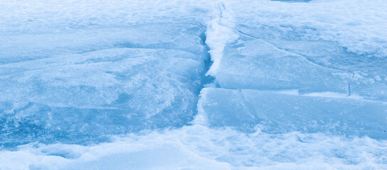 Abstract background of ice structure in a frozen lake landscape. Farnebofjarden national park in north of Sweden.