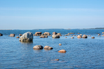 View of the Gulf of Finland and stones in the water, Lauttasaari island, Finland